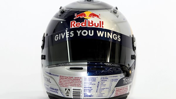 Vettel's Red Bull can helmet, complete with list of ingredients and suggestions for recycling.