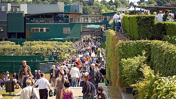 The crowds mingle during the Wimbledon Championships in 2007