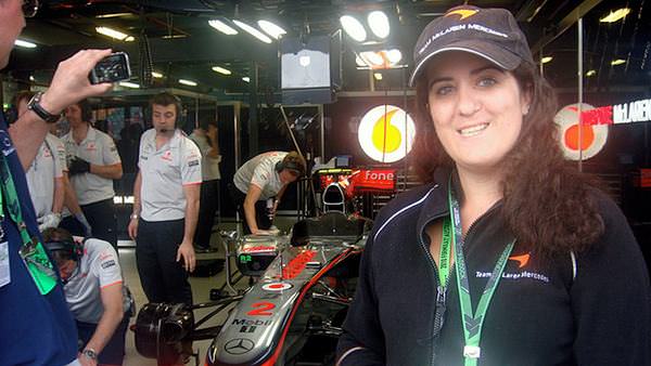 Amy gets a glimpse of Lewis Hamilton's McLaren during a pit tour