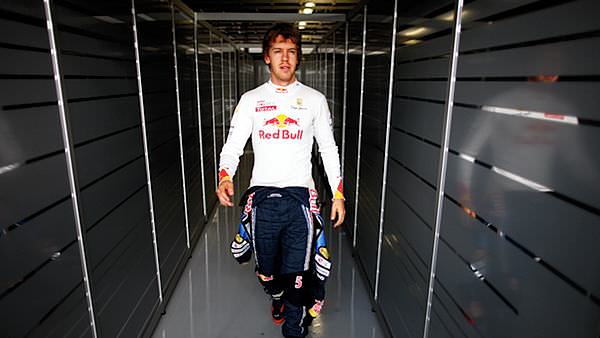 Sebastian Vettel walks with purpose during Free Practice on Friday