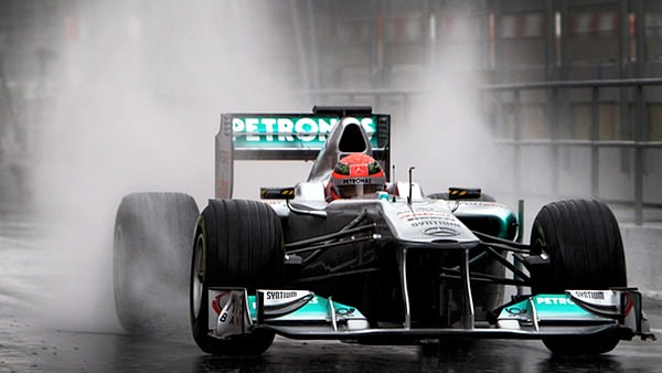 Michael Schumacher circles a very wet Barcelona circuit