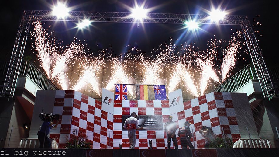 Vettel, Button and Webber celebrate their podium finish with fireworks