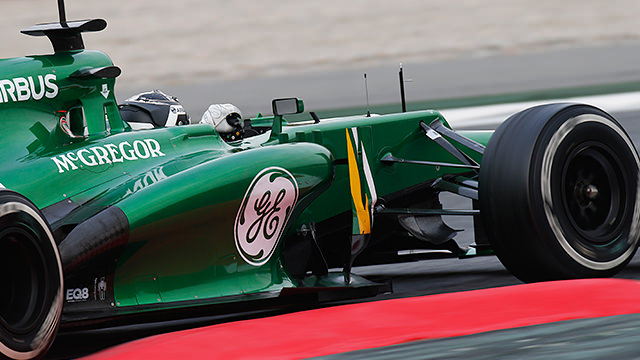 Giedo brings up the rear in his green machine