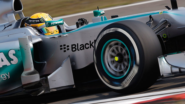 Lewis Hamilton takes first pole position for Mercedes