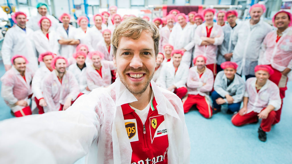 Sebastian Vettel takes a tour of the Ferrari factory