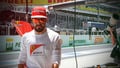 Alonso's Ferrari catches fire as red flags stop play