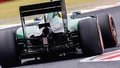 Hamilton tops Button in shortened Suzuka race