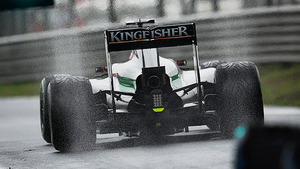 Nico exits a wet pitlane in Shanghai