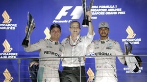 Rosberg defends from Ricciardo for race win