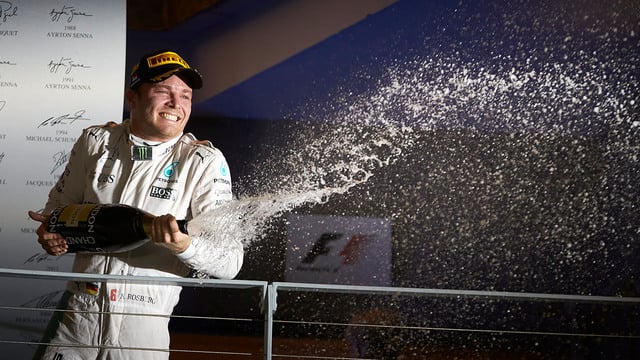 Rosberg takes championship lead after Singapore win