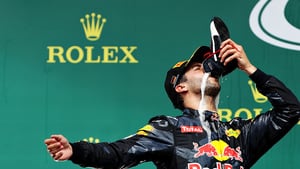 Ricciardo celebrates by drinking from his shoe