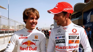 Button and Vettel chat in the Bahrain paddock