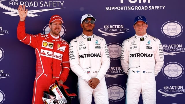 Hamilton takes pole for Spain with Vettel on the front row