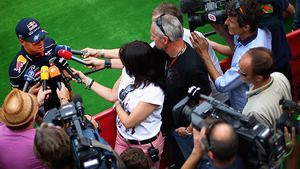 Vettel talks to the media in Spa